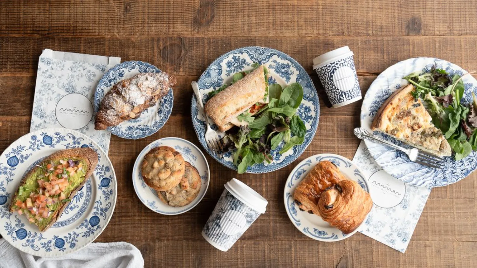 maman West Palm Beach — pastries and savory plates on signature blue-and-white floral china