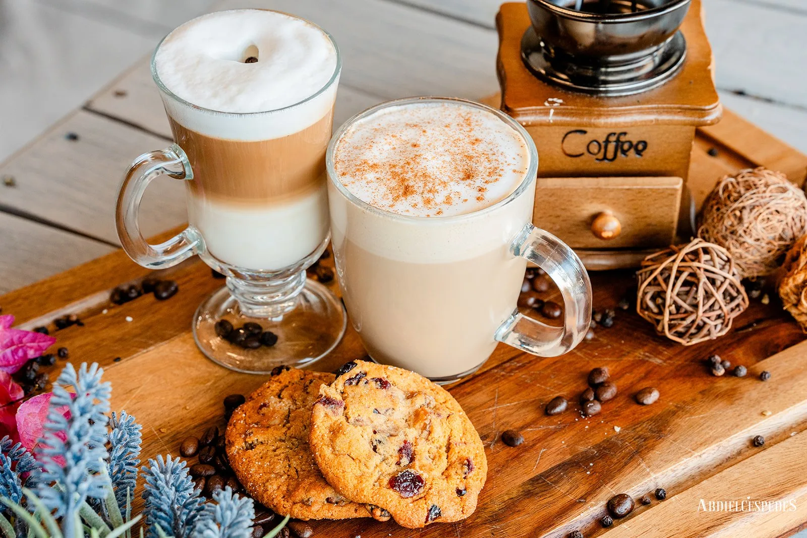 Toucan Cafe — layered cappuccino and latte with cookies